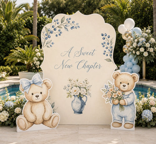 A Sweet New Chapter Backdrop Set outdoor setup with blue floral arch and teddy bear standees